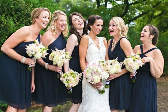 Bridesmaids in navy with vintage bouquets